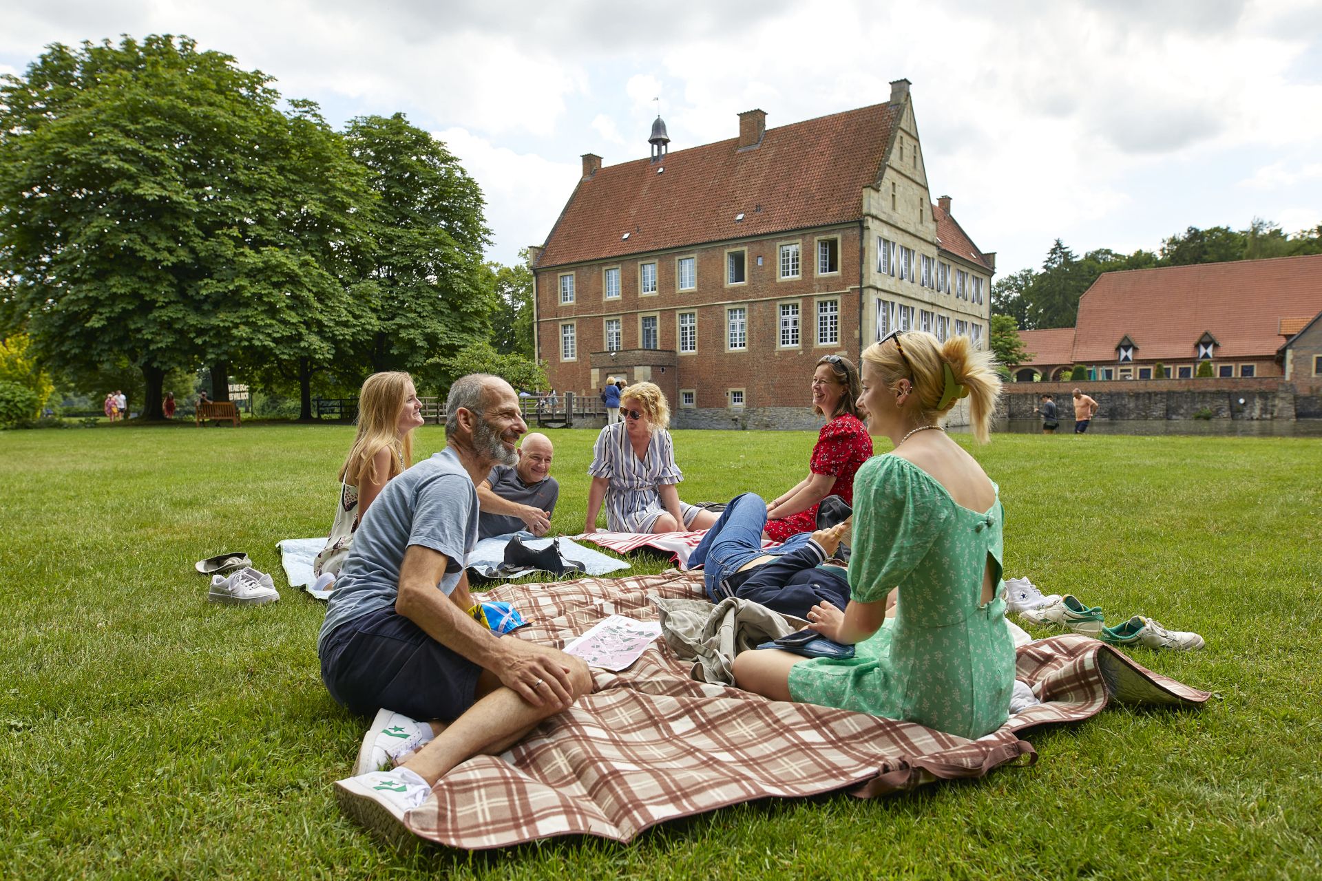 Picnics are possible on many green spaces around the historic buildings in Münsterland