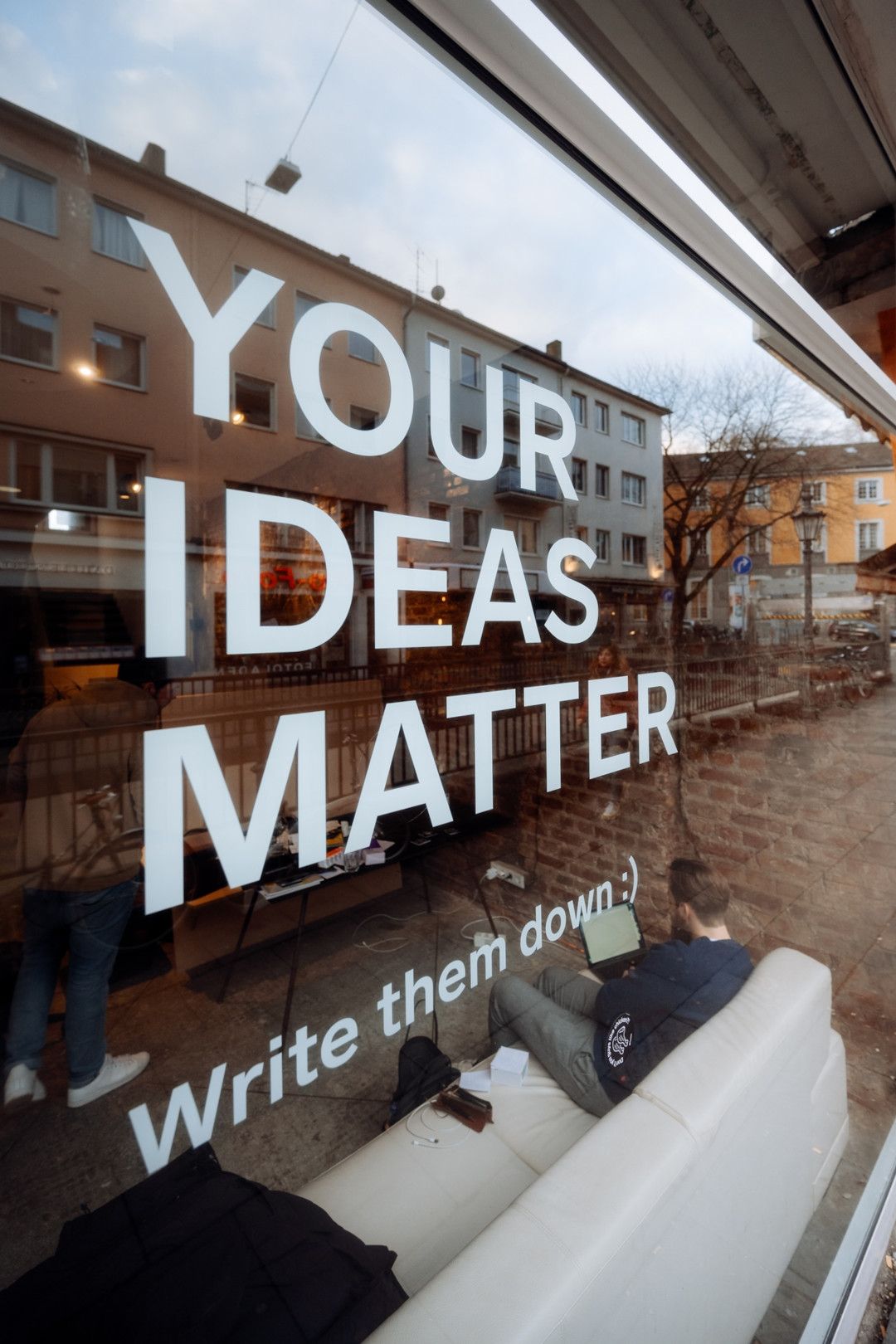 glass panel with the inscription ‘Your Ideas Matter’ the The9TH Bonn