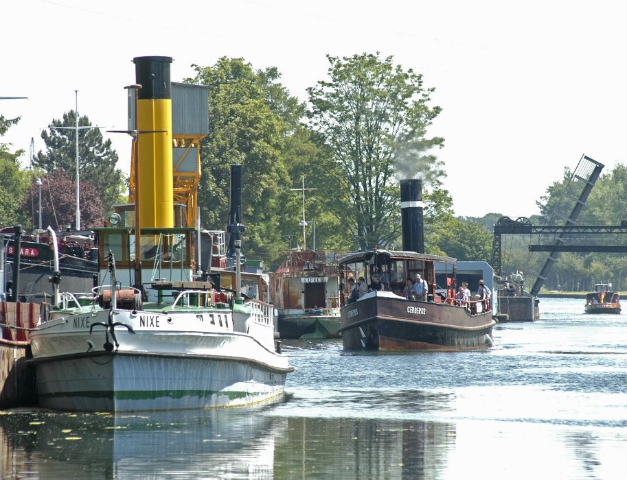 Ships moored at the upper water on the Dortmund-Ems Canal near the LWL Museum Henrichenburg ship lift