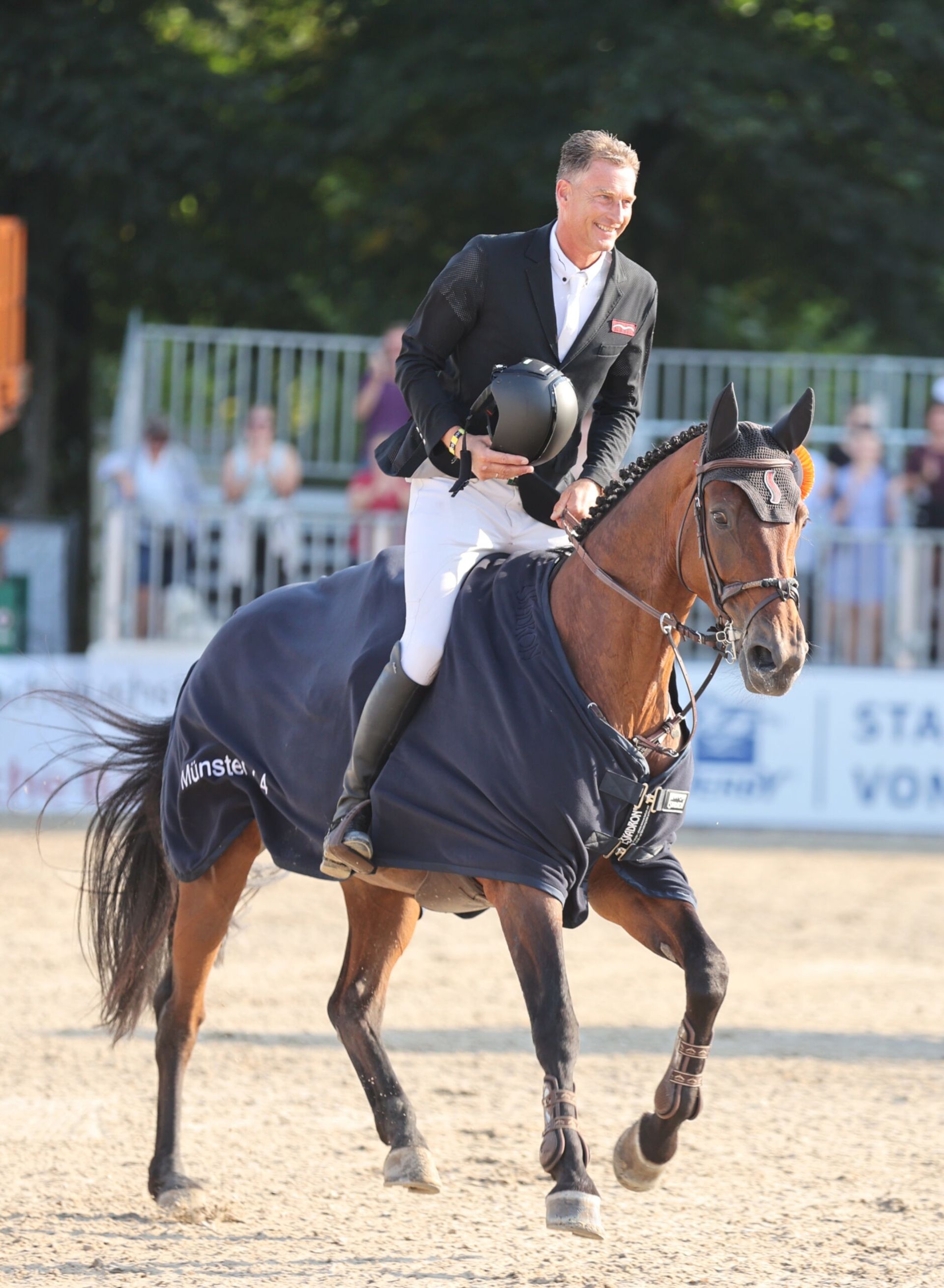 Dutchman Marc Houtzager and his horse Sterrehof's Dante win the Grand Prix in front of the castle in 2024