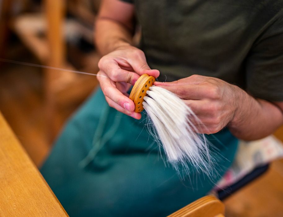 A brush maker at work in the LWL Open Air Museum Hagen