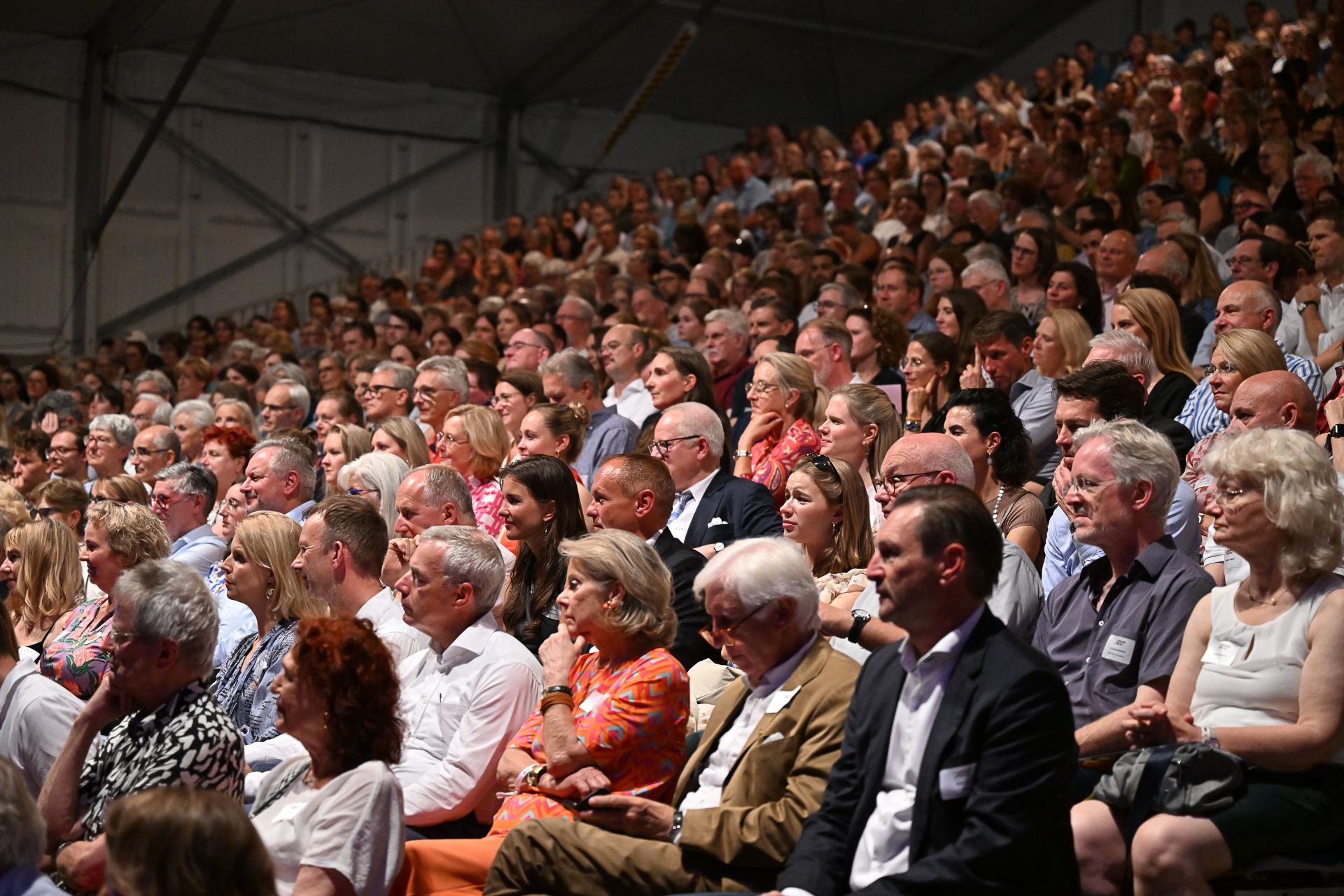 Guests gaze intently at the stage on the opening evening of the Düsseldorf Festival