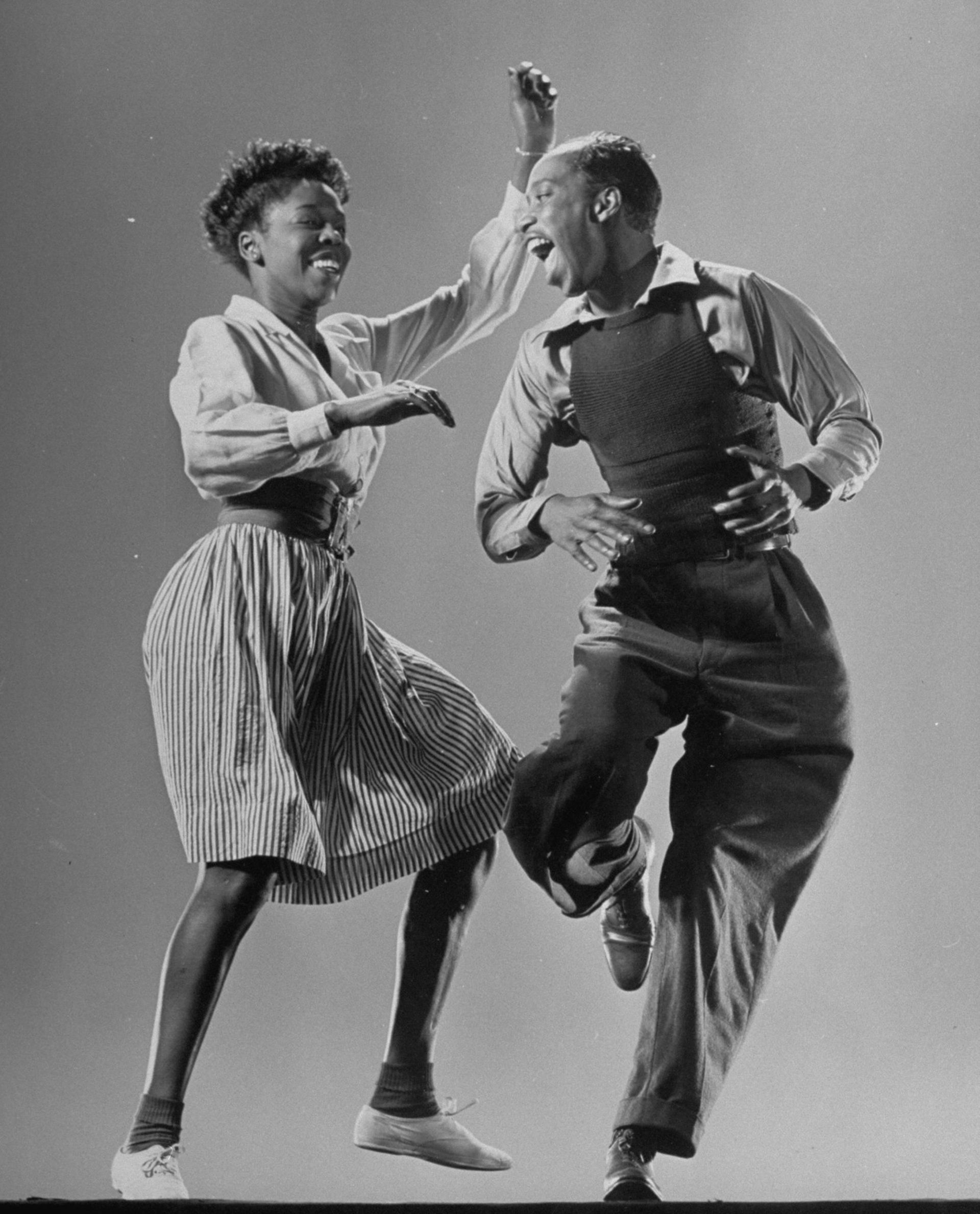 Leon James and Willa Mae Ricker demonstrate a Lindy Hop step