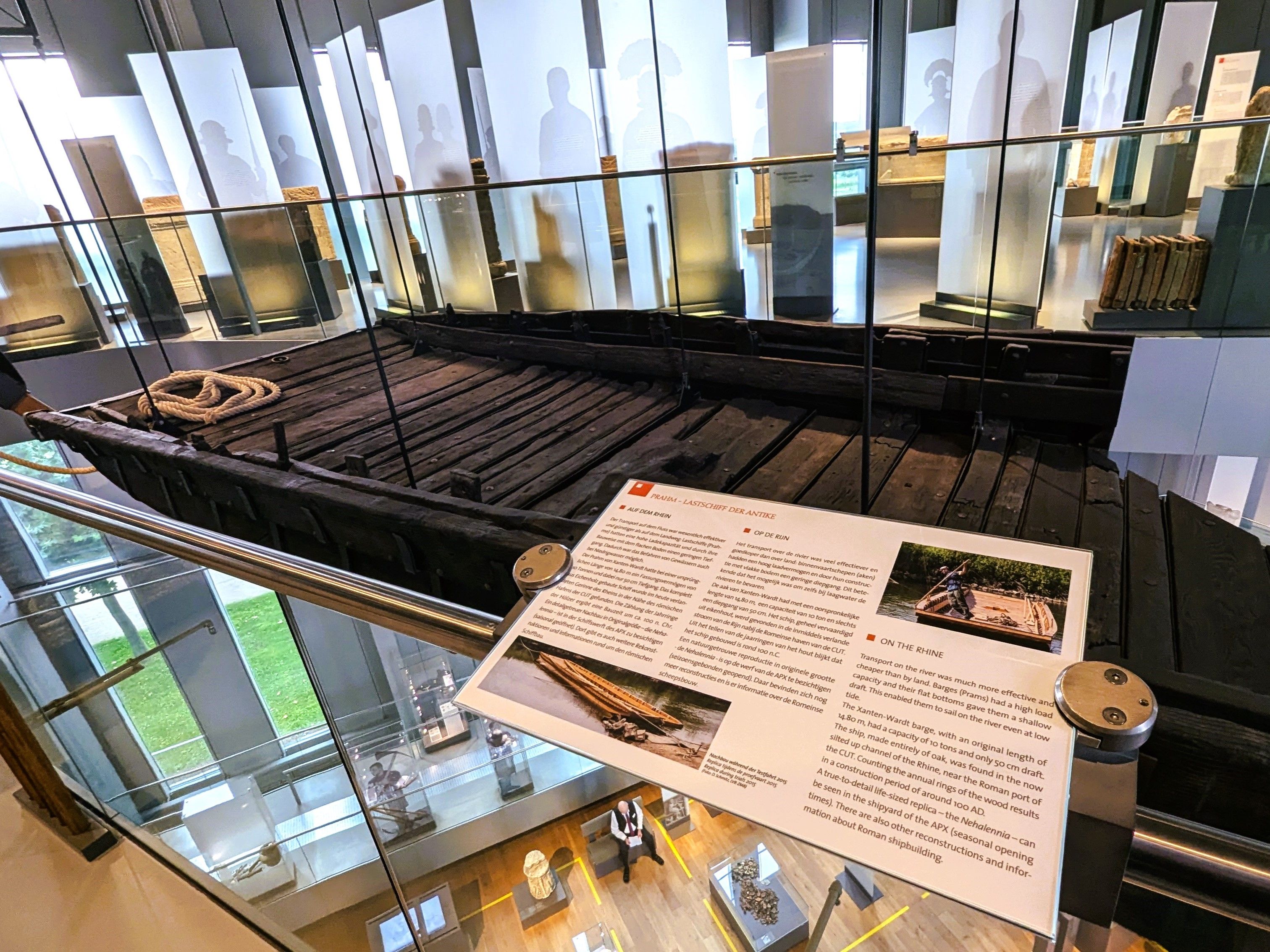 The wreck of a Roman flat-bottomed ship from Xanten-Wardt is on display for guests at the LVR-RömerMuseum